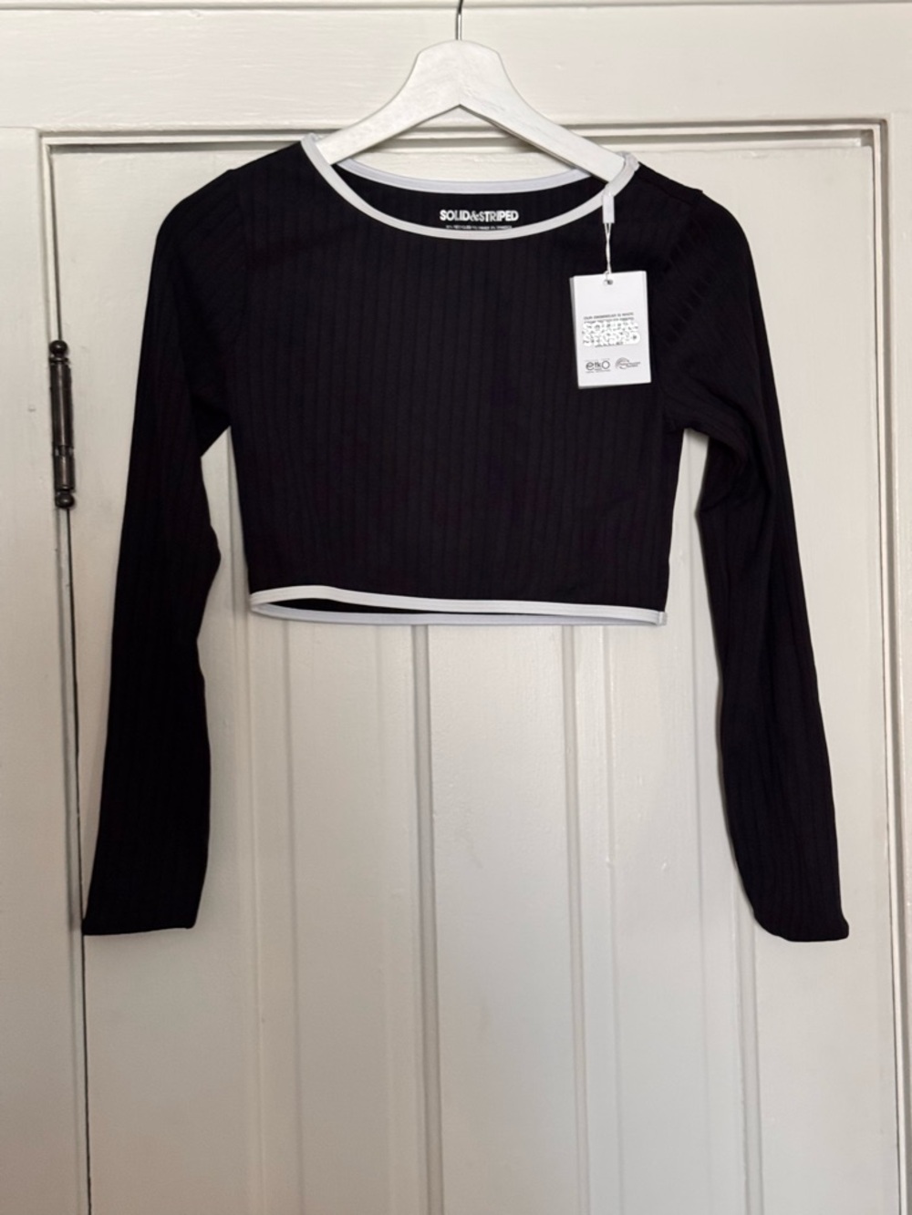 Solid & Striped Nola Rashguard in the color Blackout. Long Sleeve Crop Swim Top